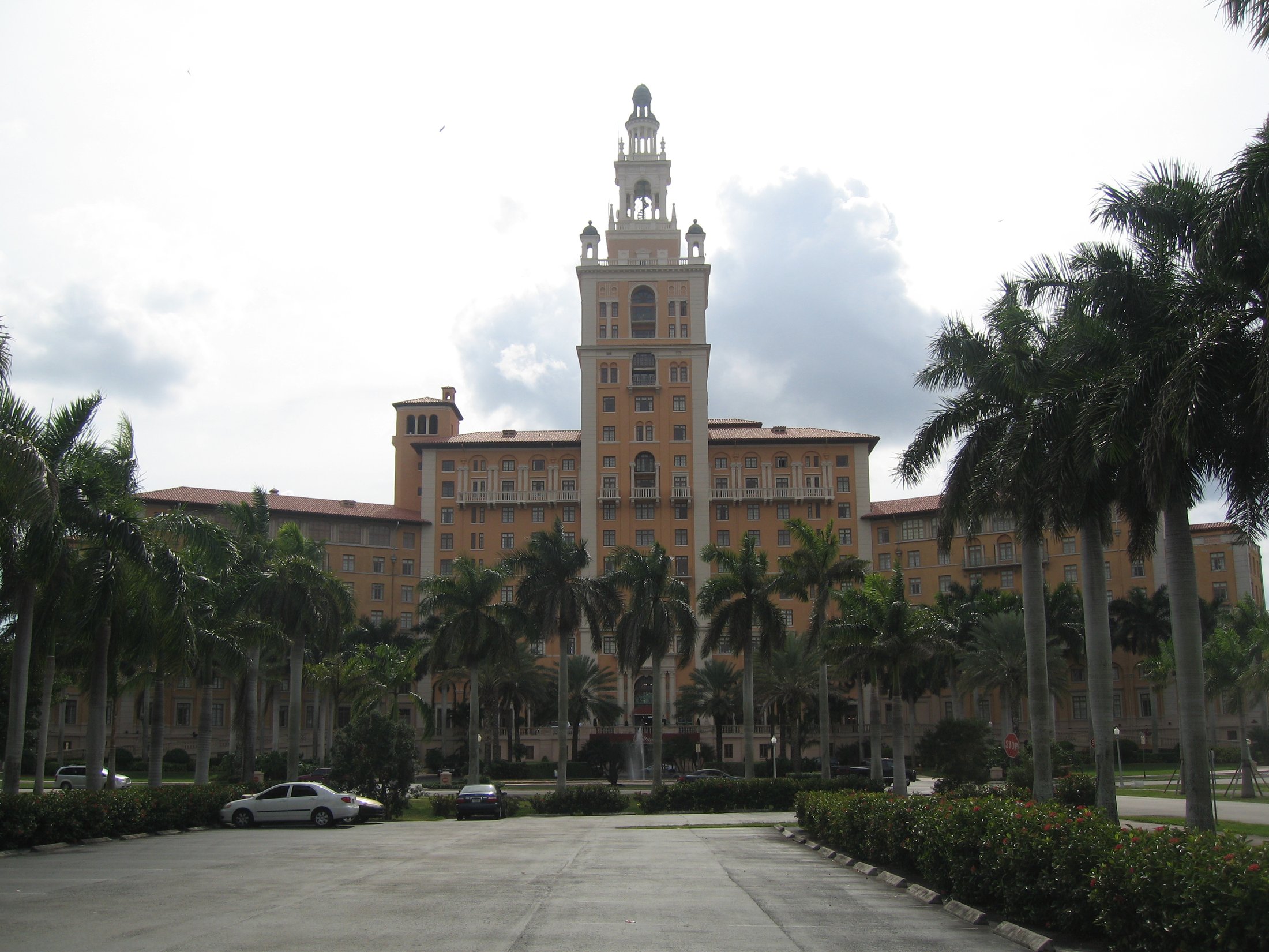 The Biltmore Hotel tower in Coral Gables framed by palm trees