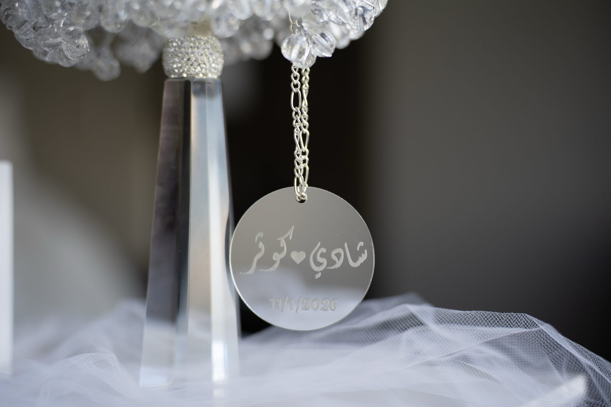 Wedding ring dish detail with tulle and florals